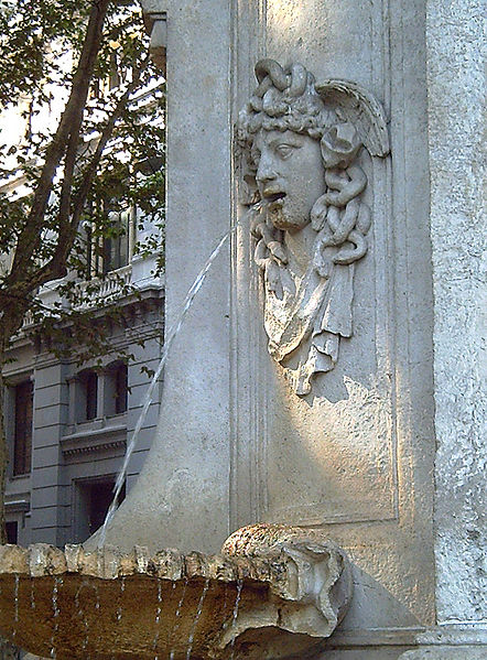 The Medusa. Detail of the Fountain of Apollo in Madrid. Medusa spits water into a shell-shaped bassin.